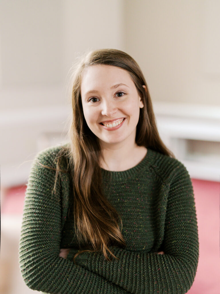 Headshot of a church team member in Raleigh, North Carolina, highlighting warmth, friendliness, and professionalism.