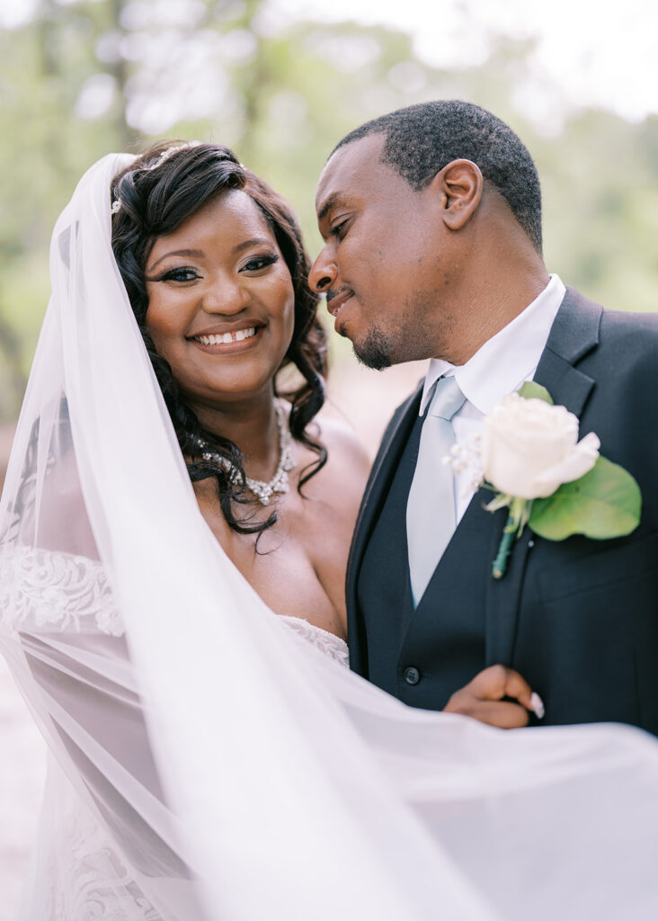 Wedding portraits of bride and groom at River Landing in North Carolina