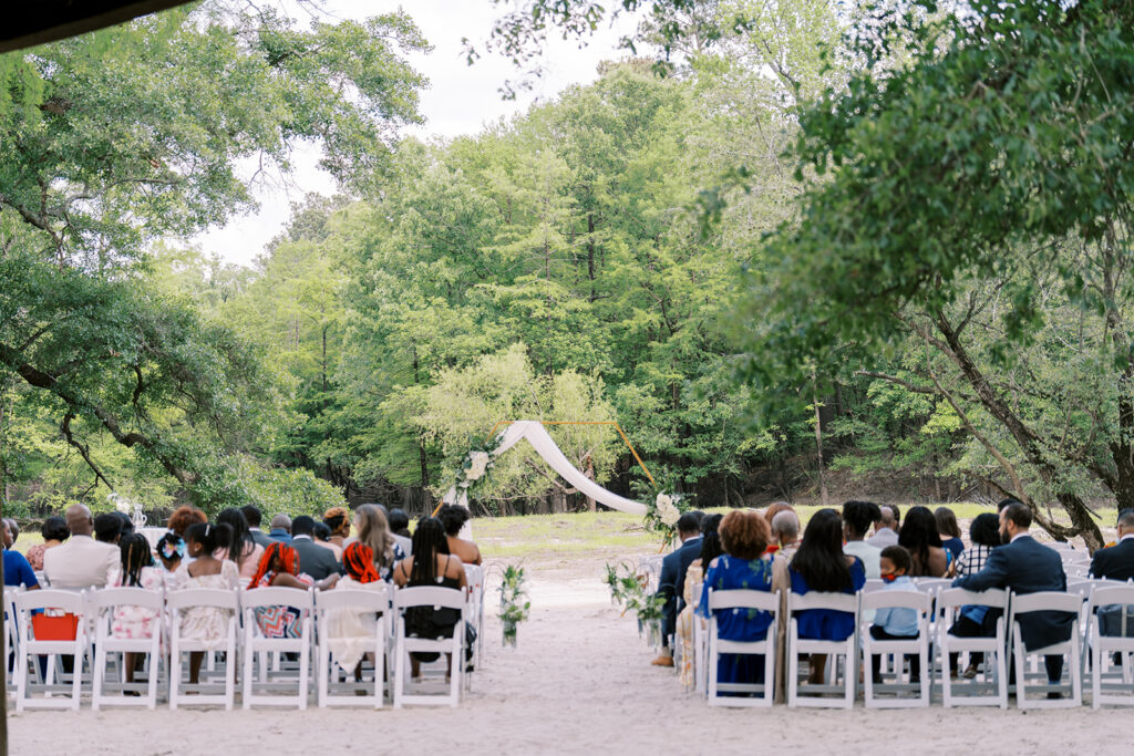 pring wedding ceremony on the sandy beach at River Landing in North Carolina