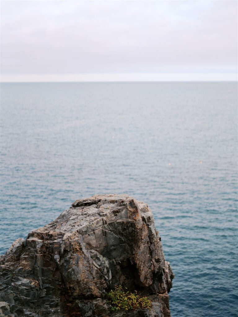 Minimalist shot of a rugged coastal cliff in Acadia Maine
