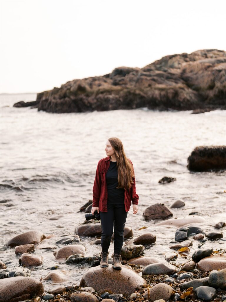 Photographer capturing dramatic sunset light at Little Hunters Beach in Acadia Maine
