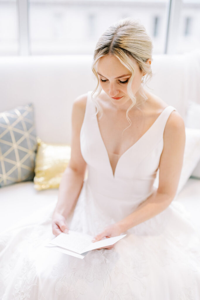 Groom’s handwritten note shown in close-up during wedding day
