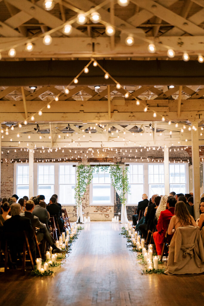 Guests gathering and settling into their seats prior to a wedding ceremony in downtown Raleigh