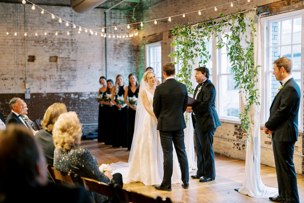 Emotional exchange between bride and groom during their wedding vows