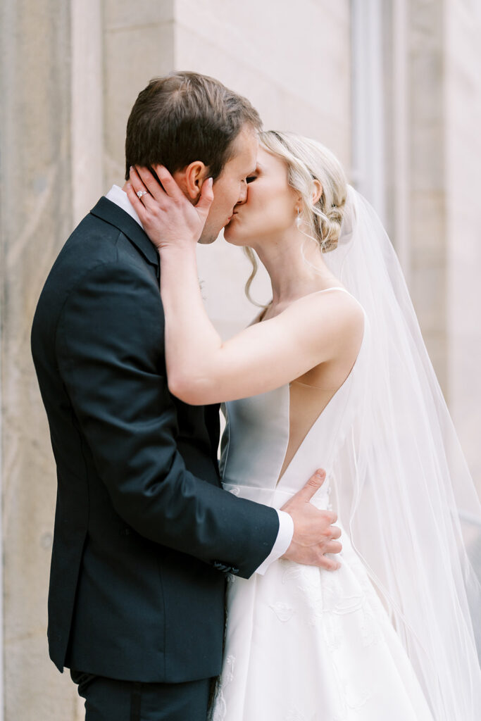 Soft winter light illuminating a wedding couple at the Raleigh Capitol grounds