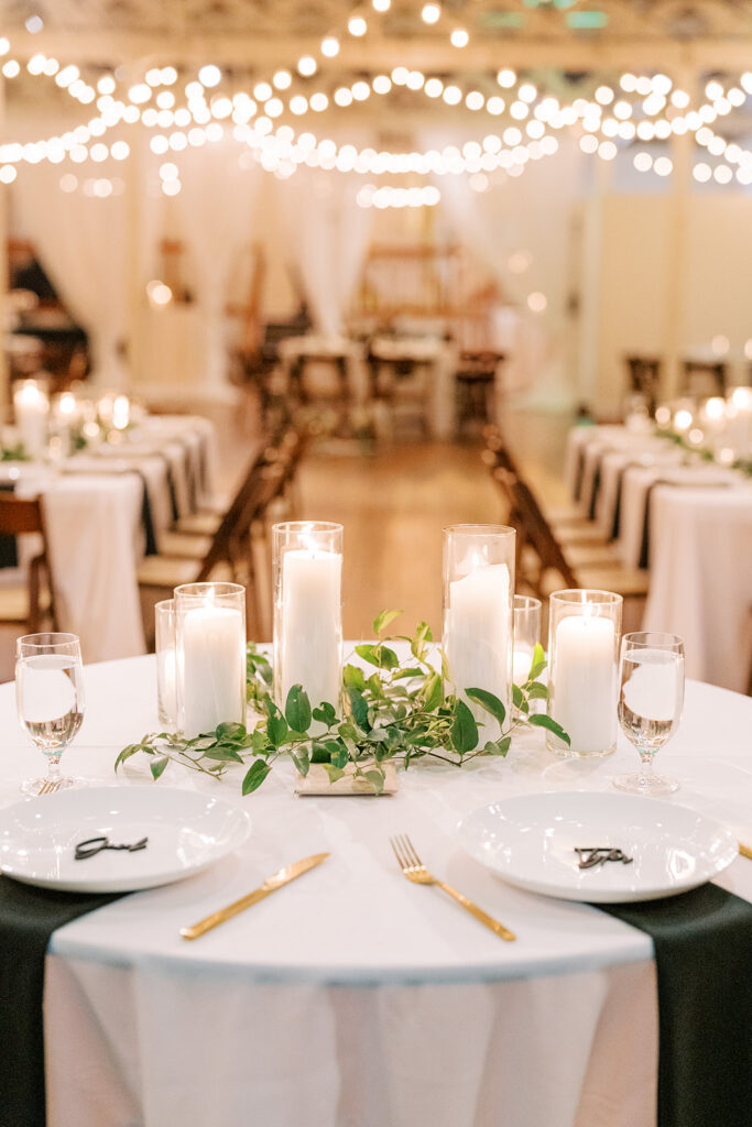 Sweetheart table set for the bride and groom overlooking the wedding guests at Stockroom 230