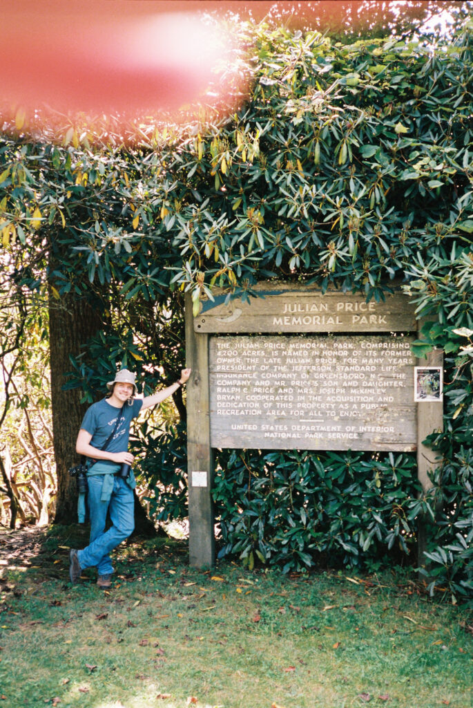 Hikers on the trail along Price Lake in Julian Price Memorial Park near Boone, NC