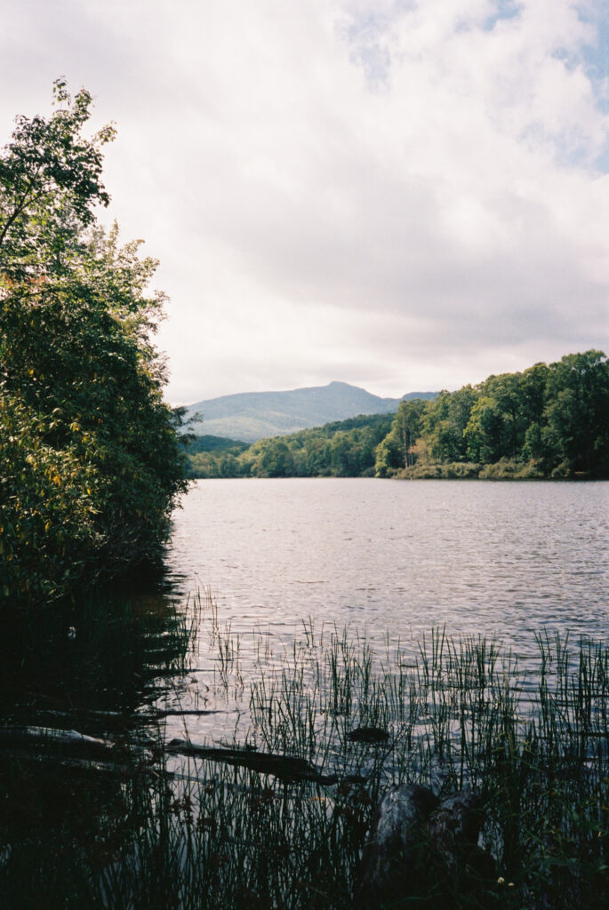 Price Lake with misty mountains in the background near Boone, NC